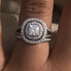 Custom moissanite and diamond halo ring