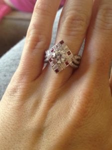 Nikki showing off her ruby and diamond ring.